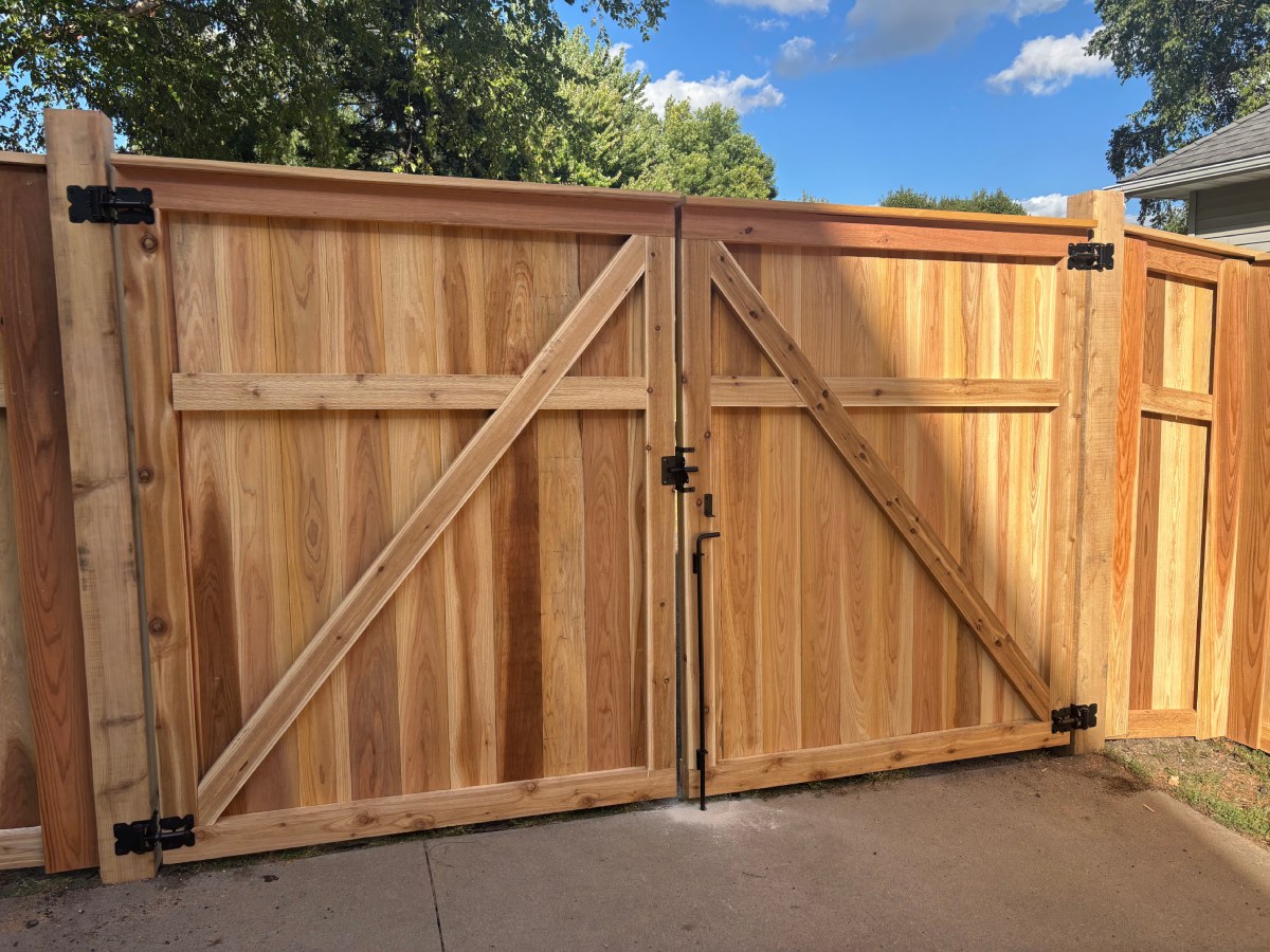 Cedar double gate with X-brace design and black hardware latch